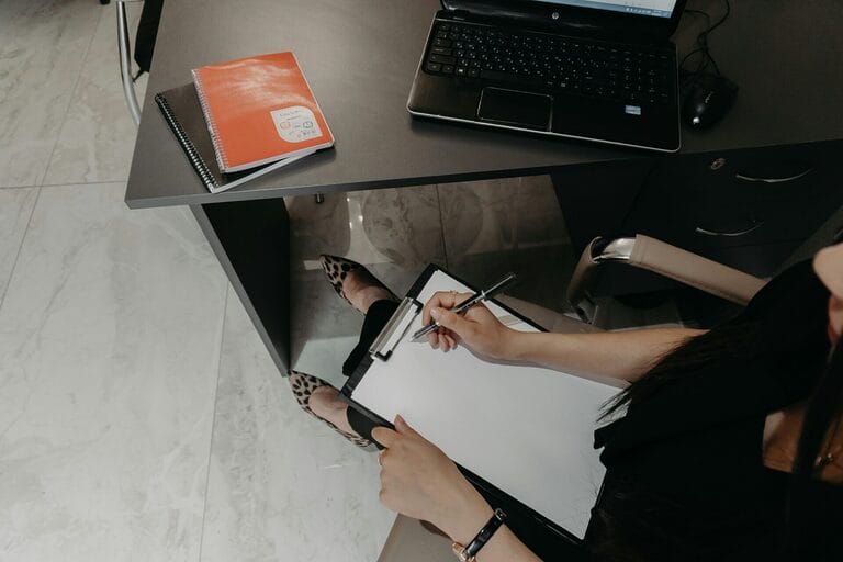 Employee organizing documents and a checklist before filing a DOLE labor complaint in the Philippines