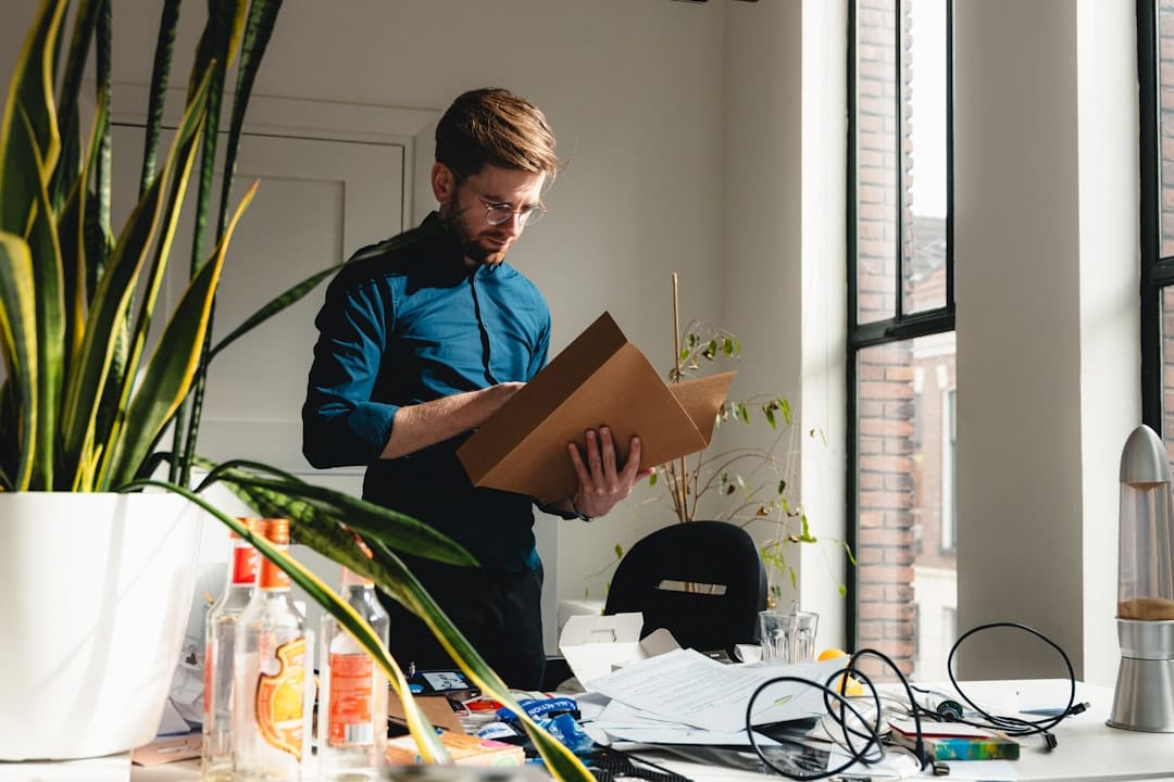 Employee packing an office desk, illustrating forced resignation and constructive dismissal in the Philippines