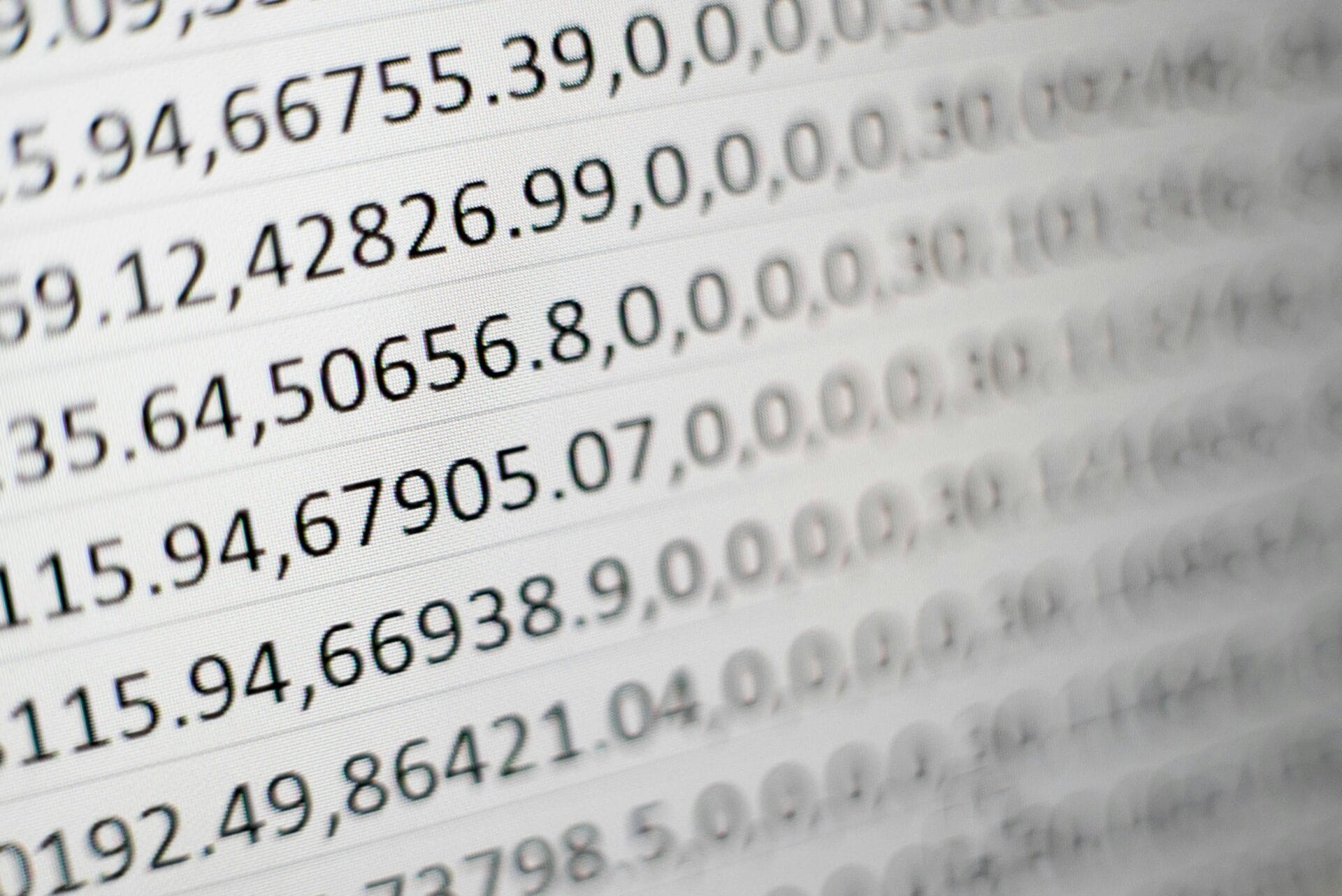 Close-up of a printed document showing itemized columns of numbers, representing the itemized earnings and deductions breakdown required on a Philippine payslip