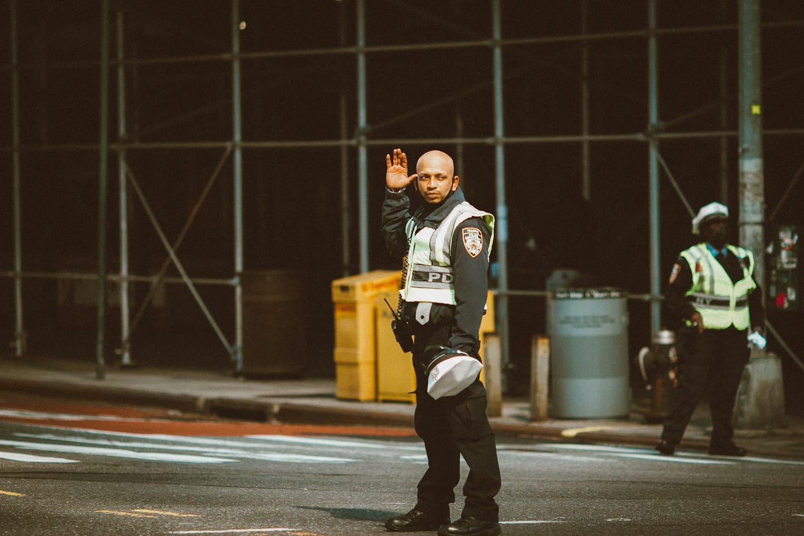 Uniformed private security guard standing alone without a post assignment, illustrating floating status and the six-month off-detail rule under Philippine labor law