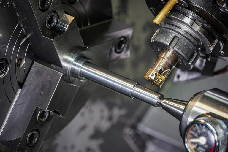 Precision machining on a lathe in a metalworking shop, the kind of highly technical occupation classified as apprenticeable under Philippine labor law