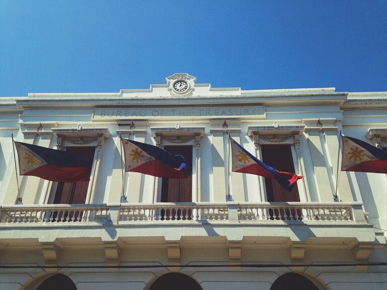 Government office building facade in the Philippines, representing the civil service offices covered by Civil Service Law rather than the Labor Code